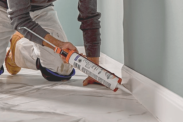 How to Caulk Baseboards to Tile Floor